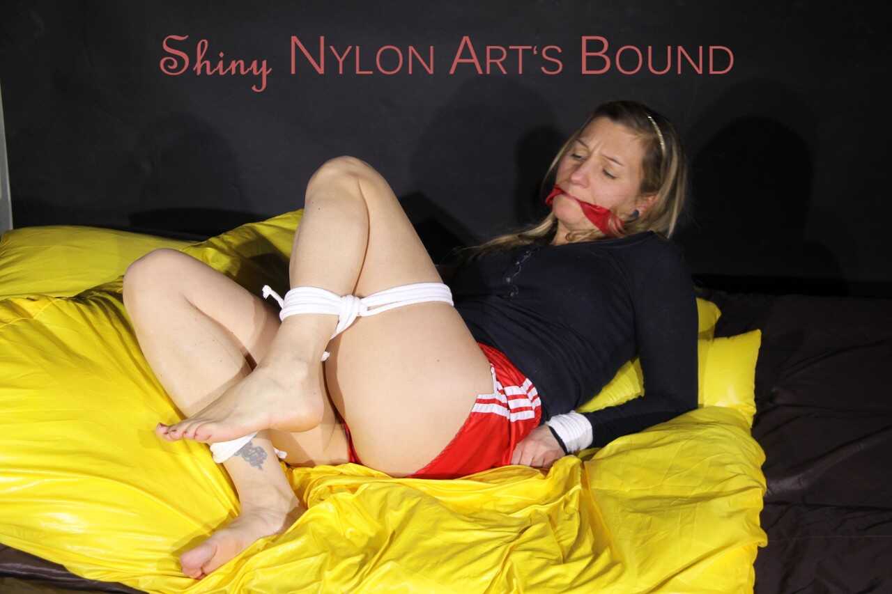 Nylon Nympho Tied Up And Tongue-Tied