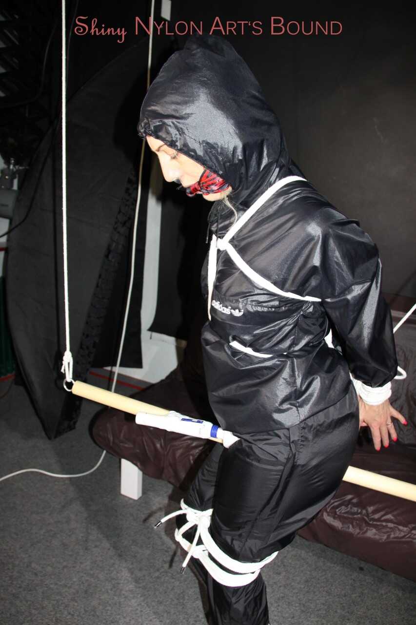 Blonde Rainwear Mistress: Restraints, Gags and Orgasms