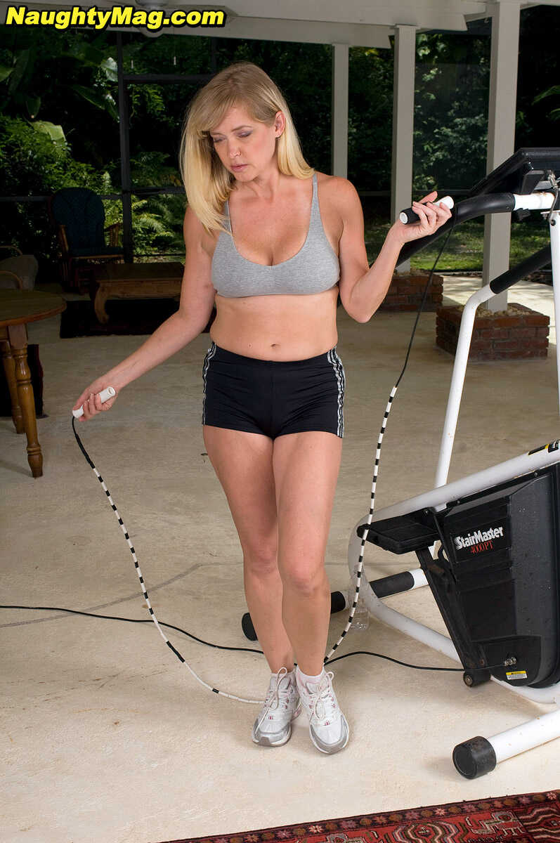 Busty blonde MILF Casey Bryant exposes her big natural tits while working out at the gym with a dildo - Casey Bryant