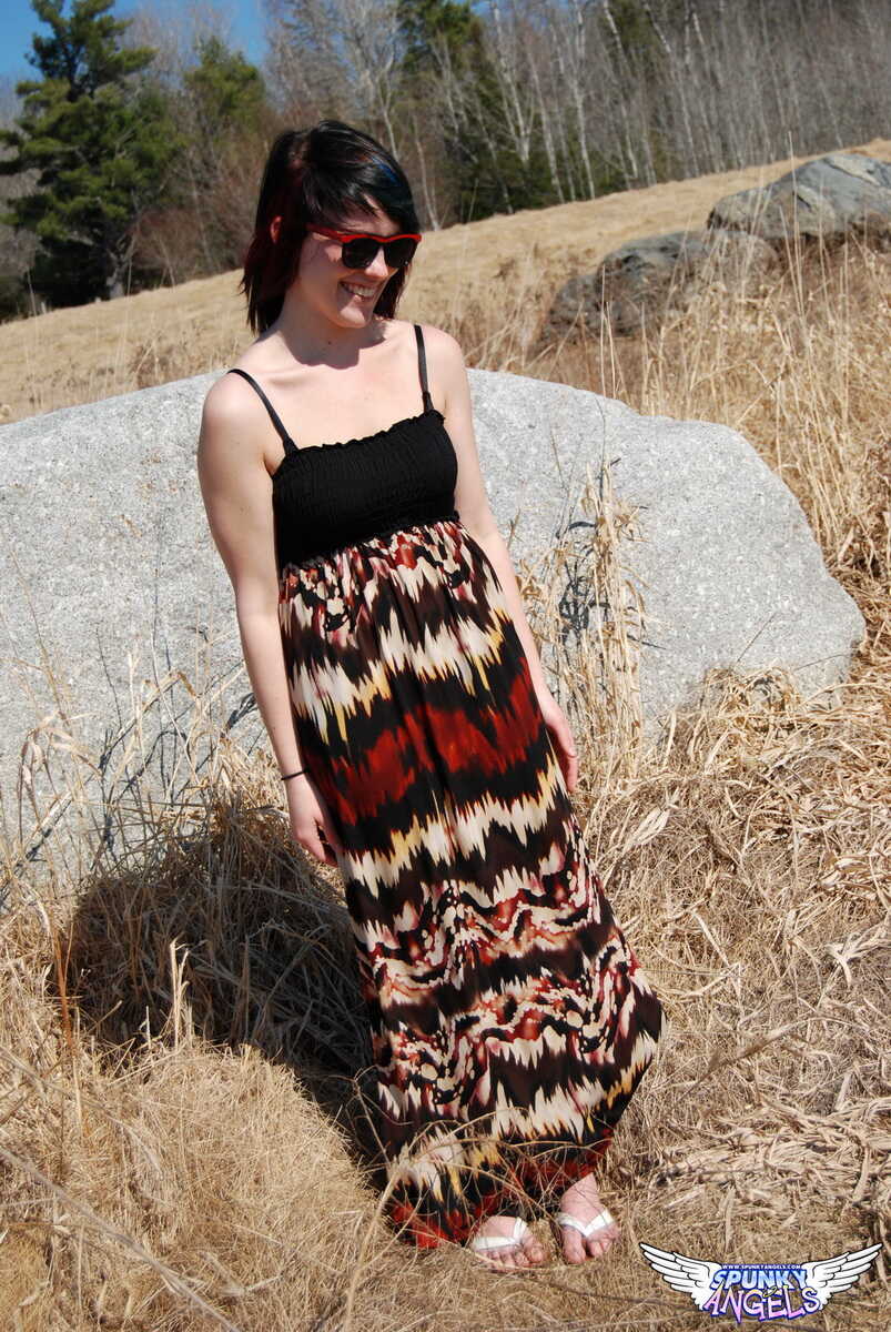 Sabrina’s Nerdy Tits Against the Boulder in the Field