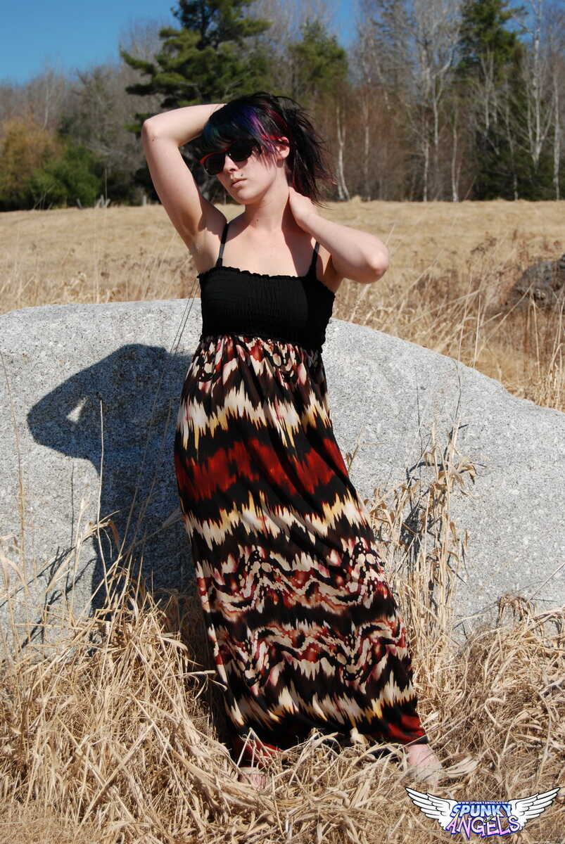 Sabrina's Nerdy Tits Against the Boulder in the Field