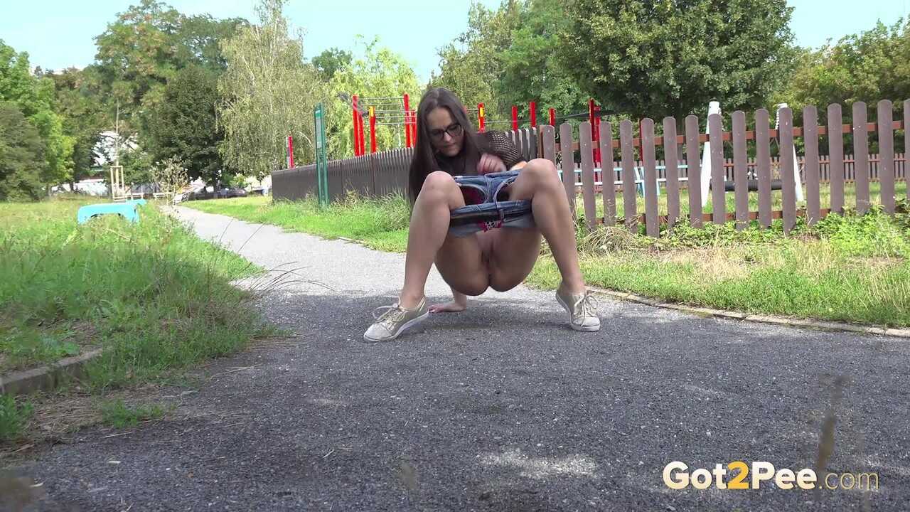 Sexy Brunette Chick Barbe Peeing While Showcasing Her Big Pussy and Ass in Shorts - Barbe