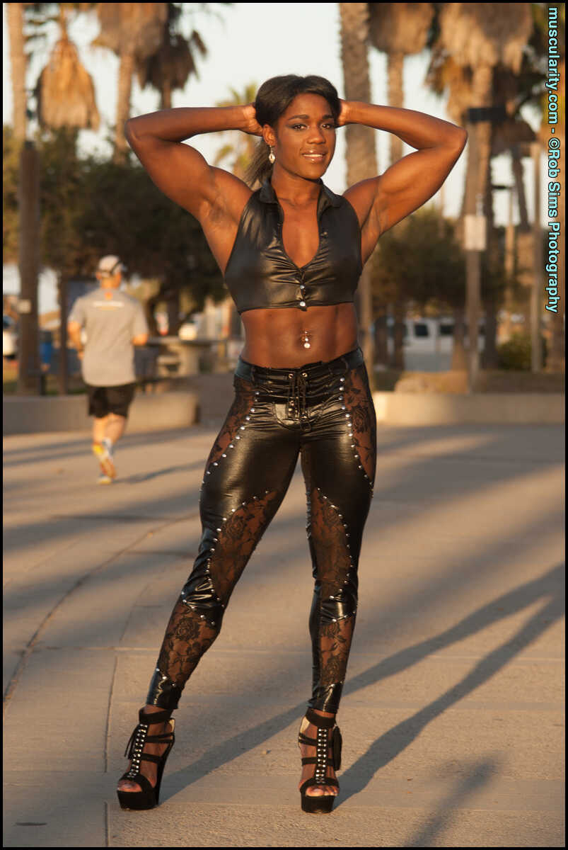 Tour of Booty: Ebony Bodybuilder Jaquita Person Taylor Shows Off Her Assets While Taking Her Dogs for a Walk in Leather Le...