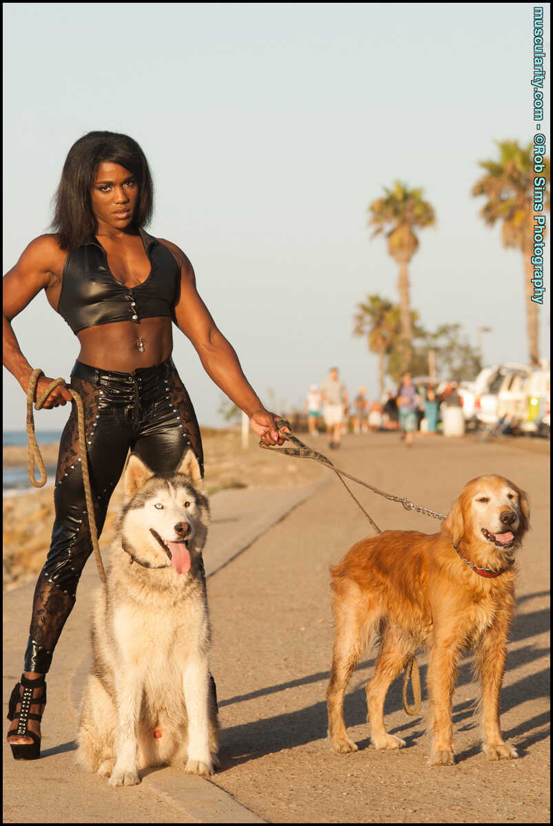 Tour of Booty: Ebony Bodybuilder Jaquita Person Taylor Shows Off Her Assets While Taking Her Dogs for a Walk in Leather Le...