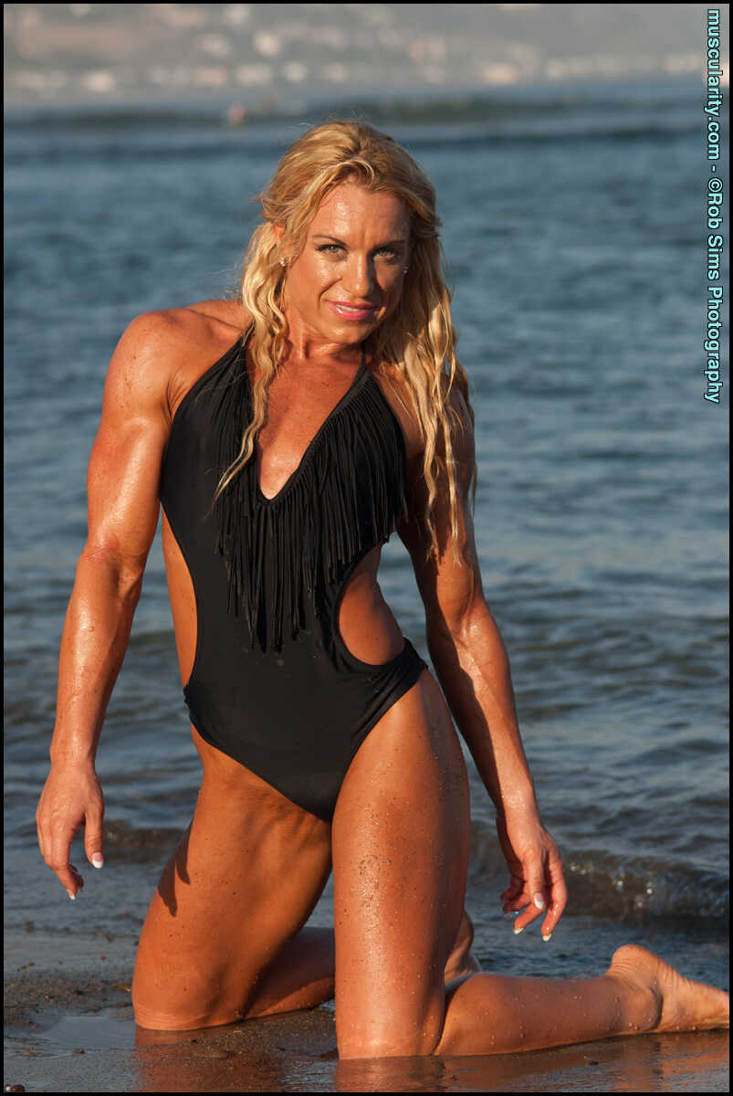 Danielle Delorefice's Ripped Muscles Unleashed on the Beach in Black Swimwear - Danielle Delorefice