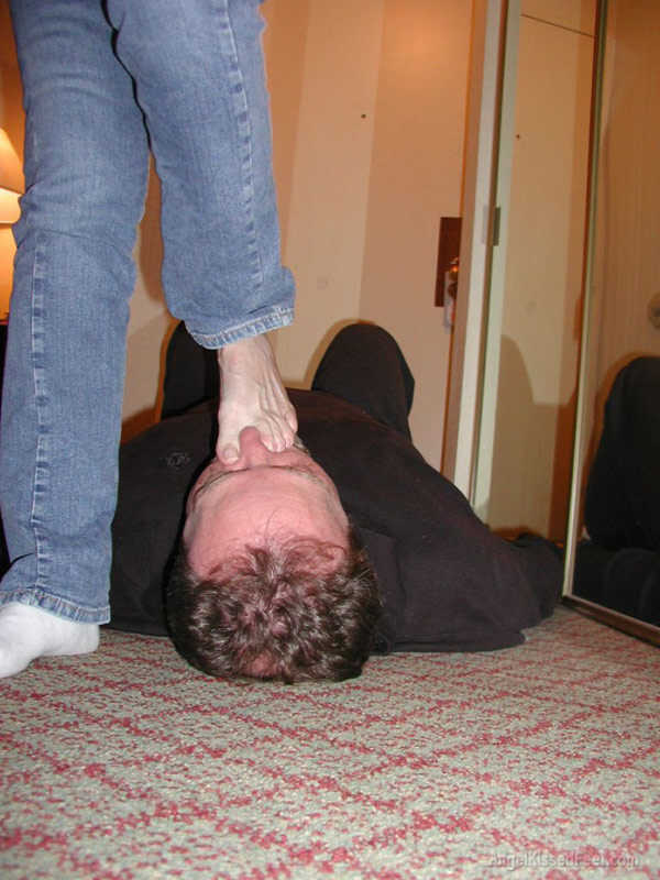 A Dominating Blonde Goddess Takes Off Her Socks While Having Her Mature Feet Worshiped and Smothered with Jeans - 