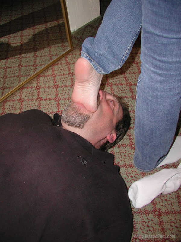 A Dominating Blonde Goddess Takes Off Her Socks While Having Her Mature Feet Worshiped and Smothered with Jeans - 