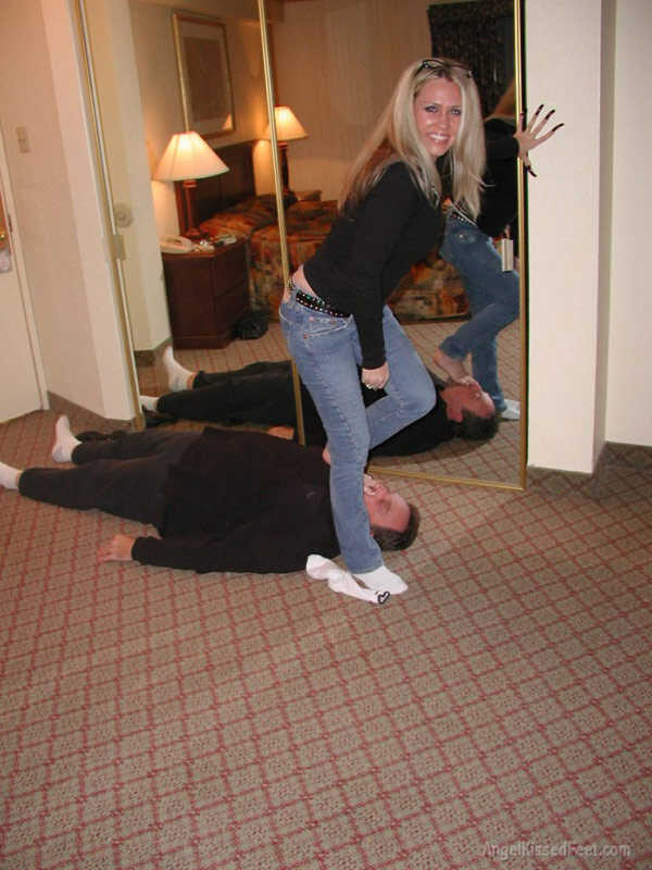 A Dominating Blonde Goddess Takes Off Her Socks While Having Her Mature Feet Worshiped and Smothered with Jeans - 