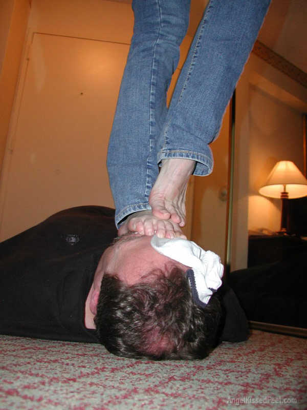 A Dominating Blonde Goddess Takes Off Her Socks While Having Her Mature Feet Worshiped and Smothered with Jeans - 