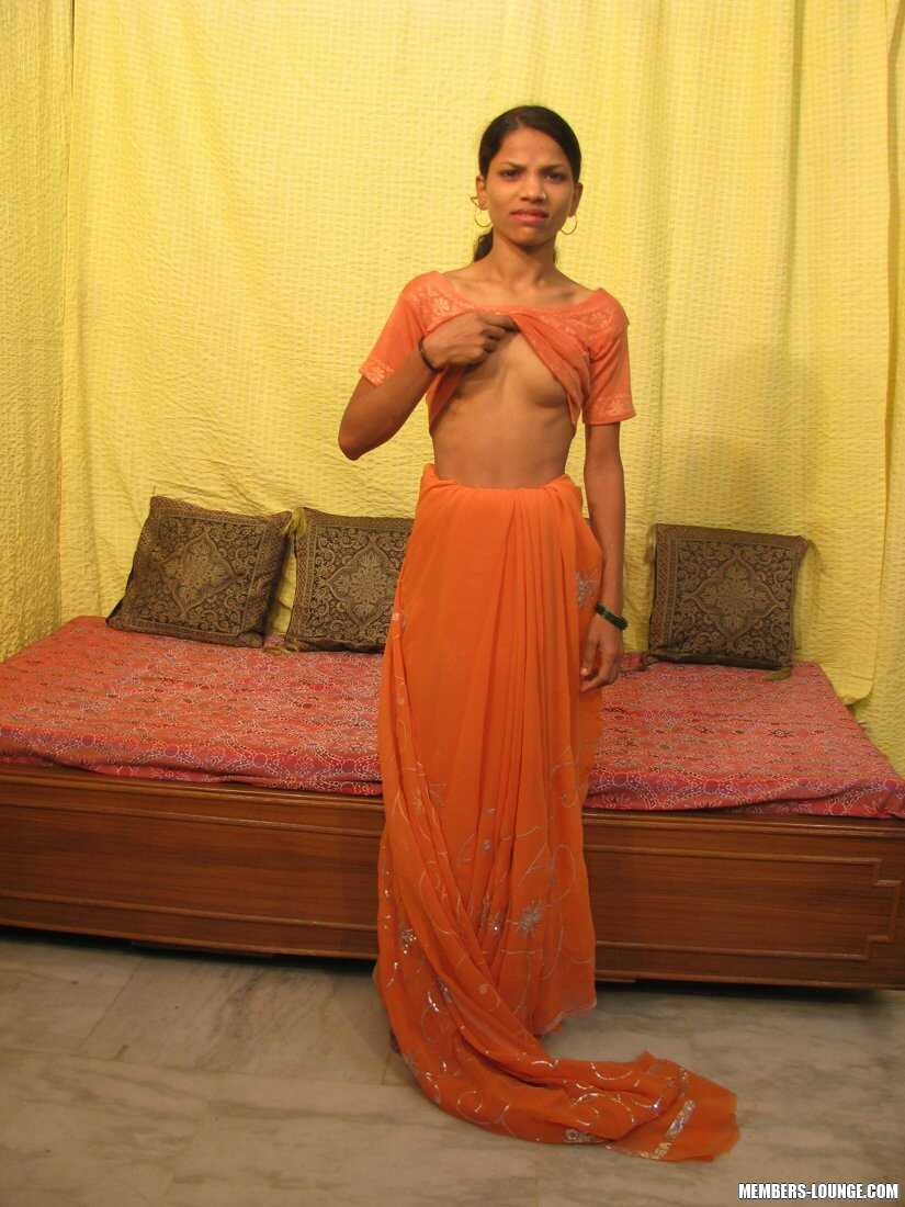 Indian Nymphomaniac: Skinny Brunette Spreads Her Tiny Pink Pussy For Your Pleasure