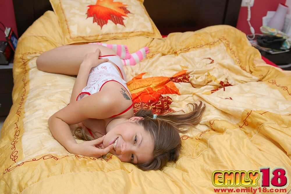Teeny Babysitter Playing With Her Pussy In Socks While On Top Of A Bed - 
