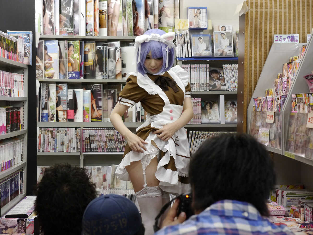 Japanese cosplayer Miku Oguri gets gangbanged by a group of horny adult video store customers while wearing her sexiest co...