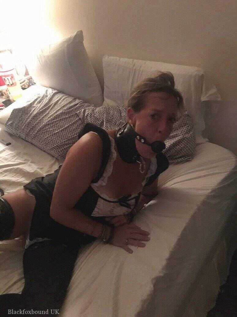 Busty babysitter gets caught up in a kinky bind and gag scenario with her neighbor - 