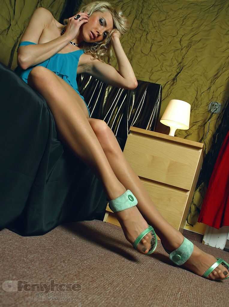 Mature Blonde in Pantyhose Shows Off Her Long Legs and Feet - 