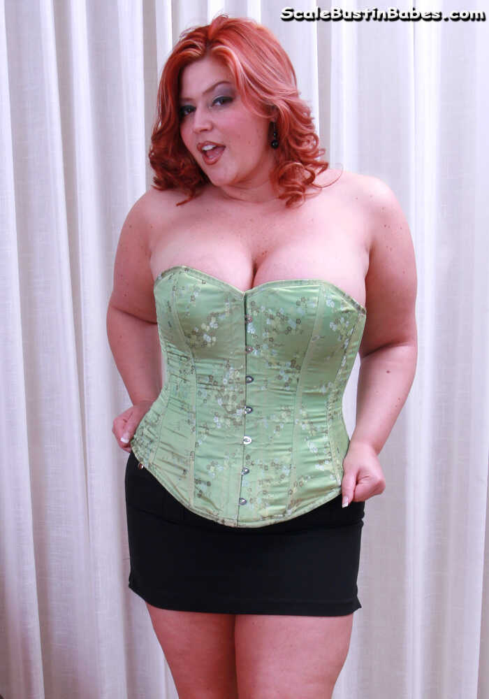 Overweight redhead Eden 38dd shows off her big tits in a skirt before a POV blowjob. - Eden 38dd