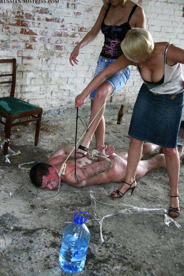 Buxom Blonde Country Girls Cruelly Trample and Smack Their Naked Servant's Face While He's on His Knees - 