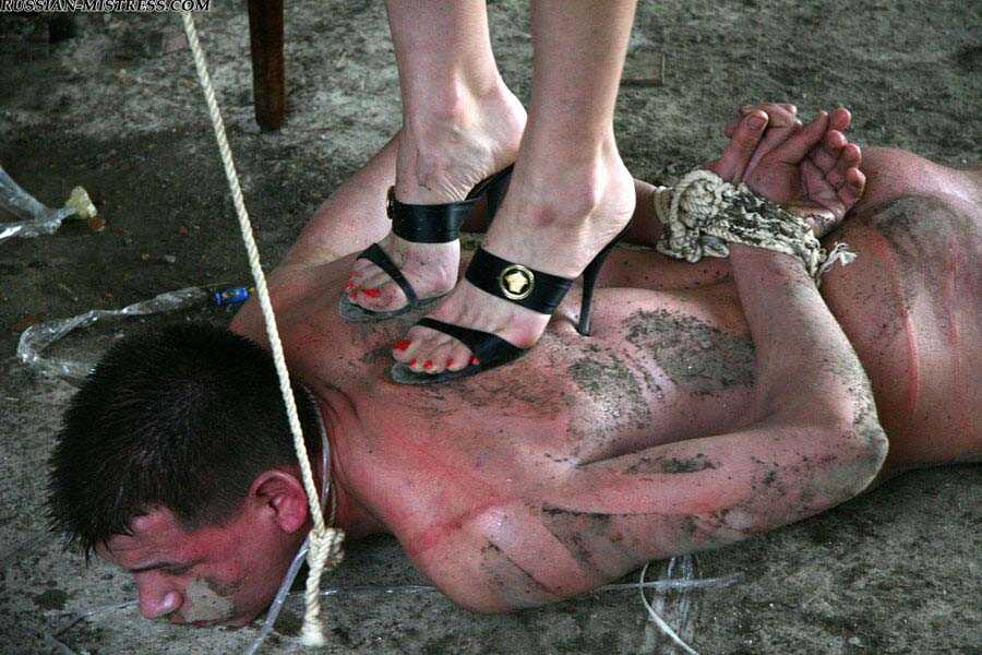 Buxom Blonde Country Girls Cruelly Trample and Smack Their Naked Servant's Face While He's on His Knees - 