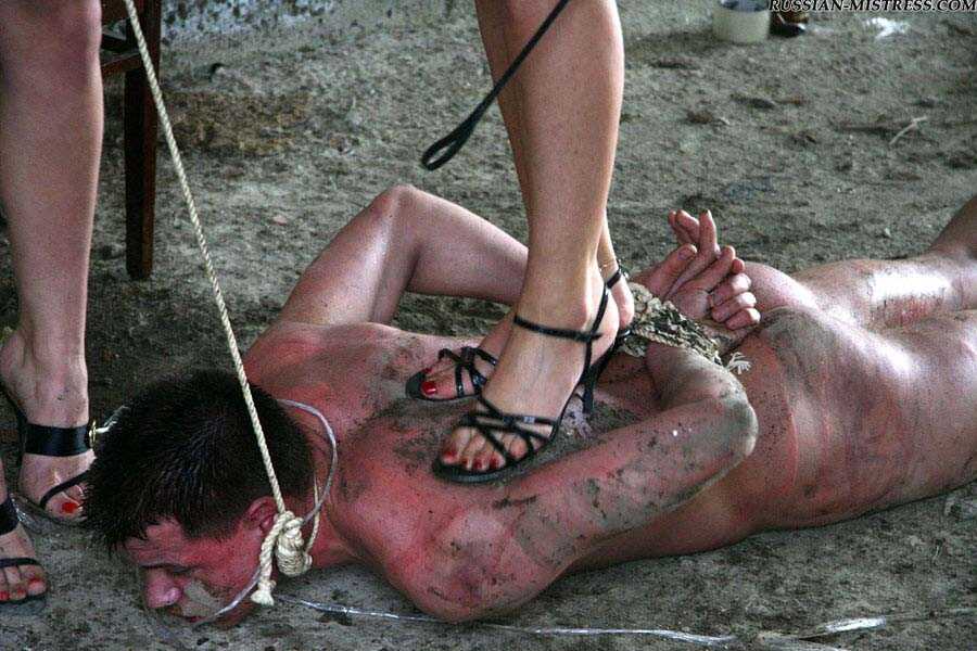 Buxom Blonde Country Girls Cruelly Trample and Smack Their Naked Servant's Face While He's on His Knees - 