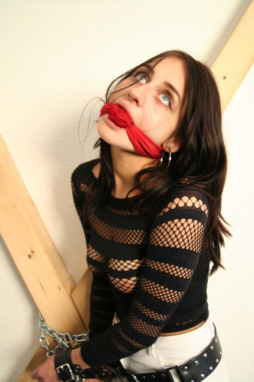 Brunette Latex Queen: Restrained in Bondage Gear, Fitted With a Cleave Gag for Non-Nude BDSM Action - 