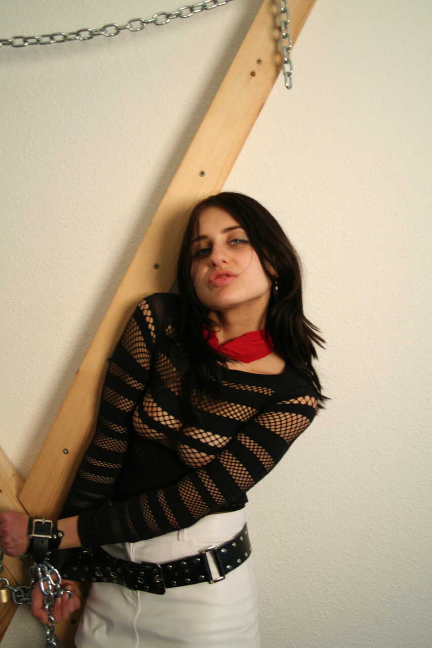 Brunette Latex Queen: Restrained in Bondage Gear, Fitted With a Cleave Gag for Non-Nude BDSM Action - 