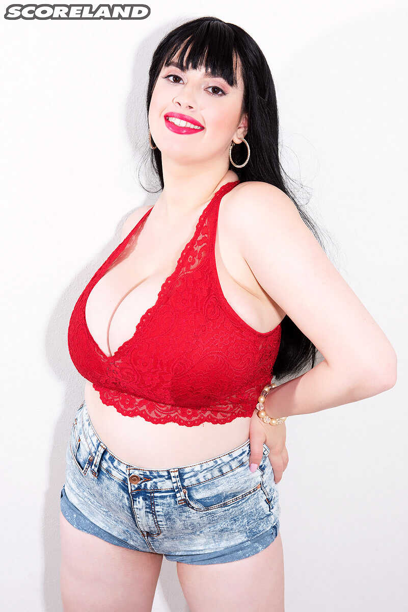 Dark-haired Dina Sahari's red lips unleash her chubby big tits in a solo show - Dina Sahari