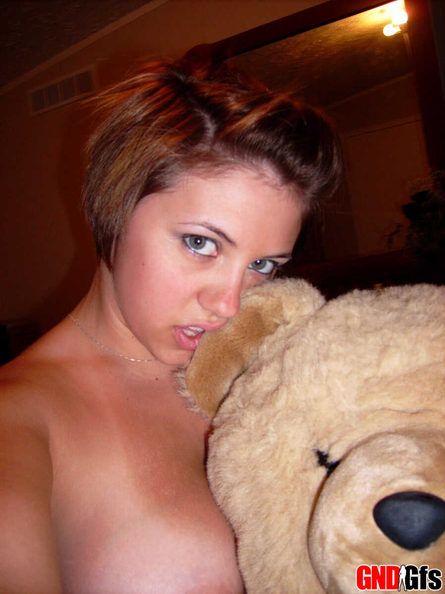 Titillating Tease! Chubby Amateur with Short Hair and Big Tits Takes a Series of Naughty Self Shots - 