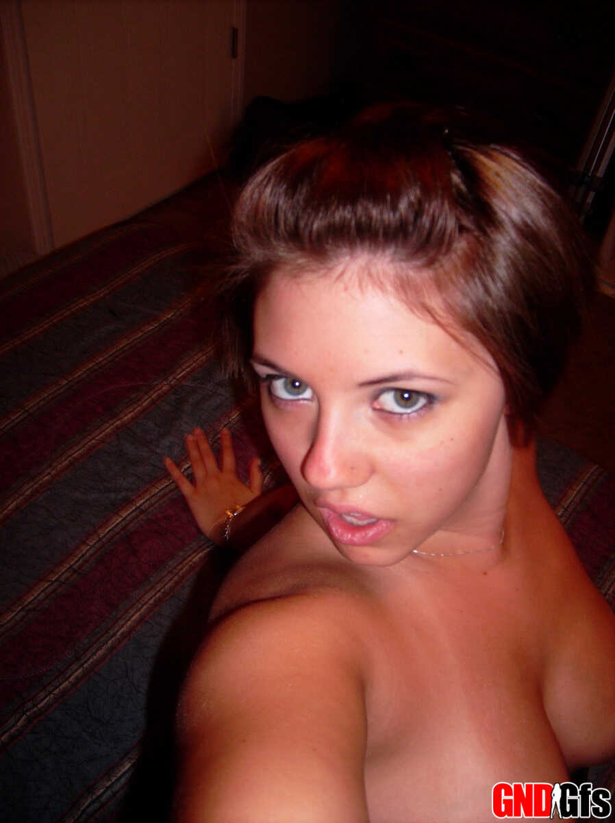 Titillating Tease! Chubby Amateur with Short Hair and Big Tits Takes a Series of Naughty Self Shots - 