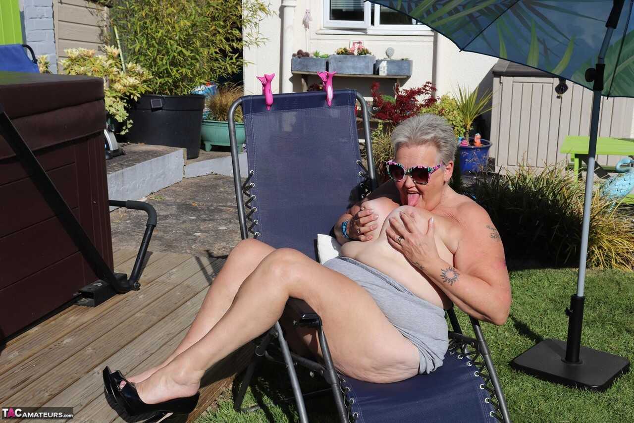 Mature Mommy Gets Wet and Wild in the Backyard with Shoe Licking Antics - Valgasmic Exposed