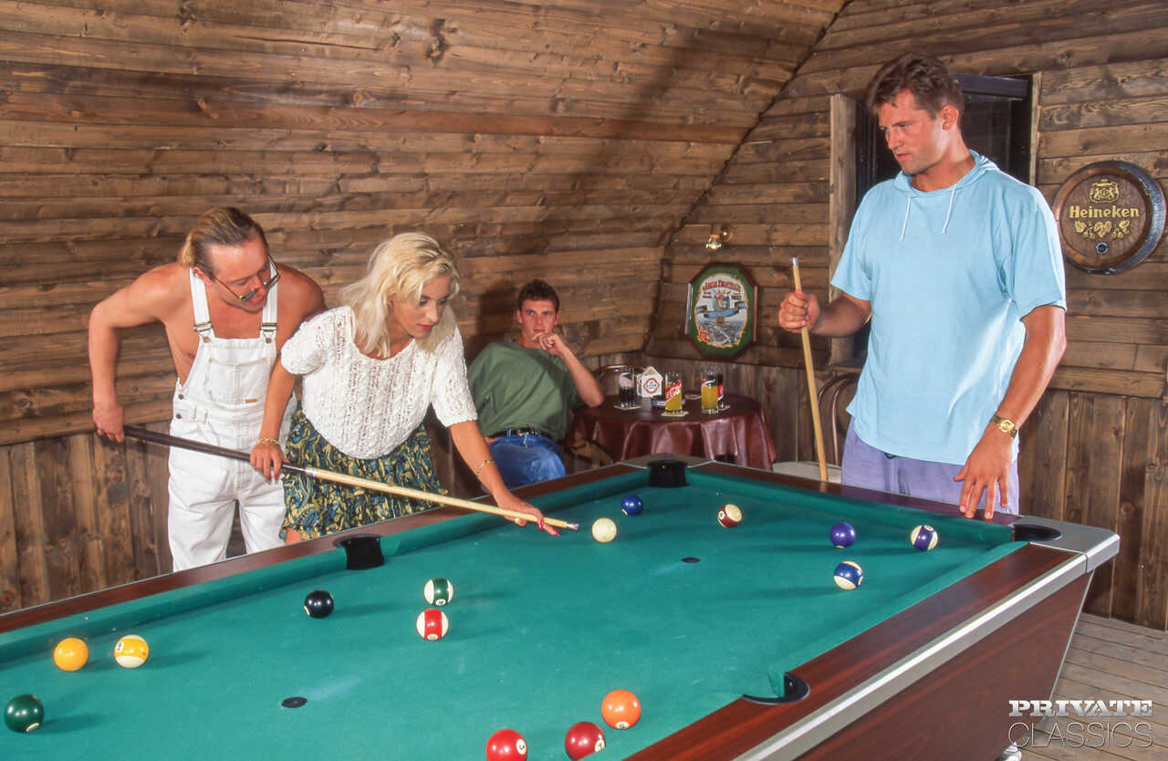 Blue-eyed blonde Monika Bella gets double penetrated on top of a pool table by two vintage guys with huge tits anal and re...