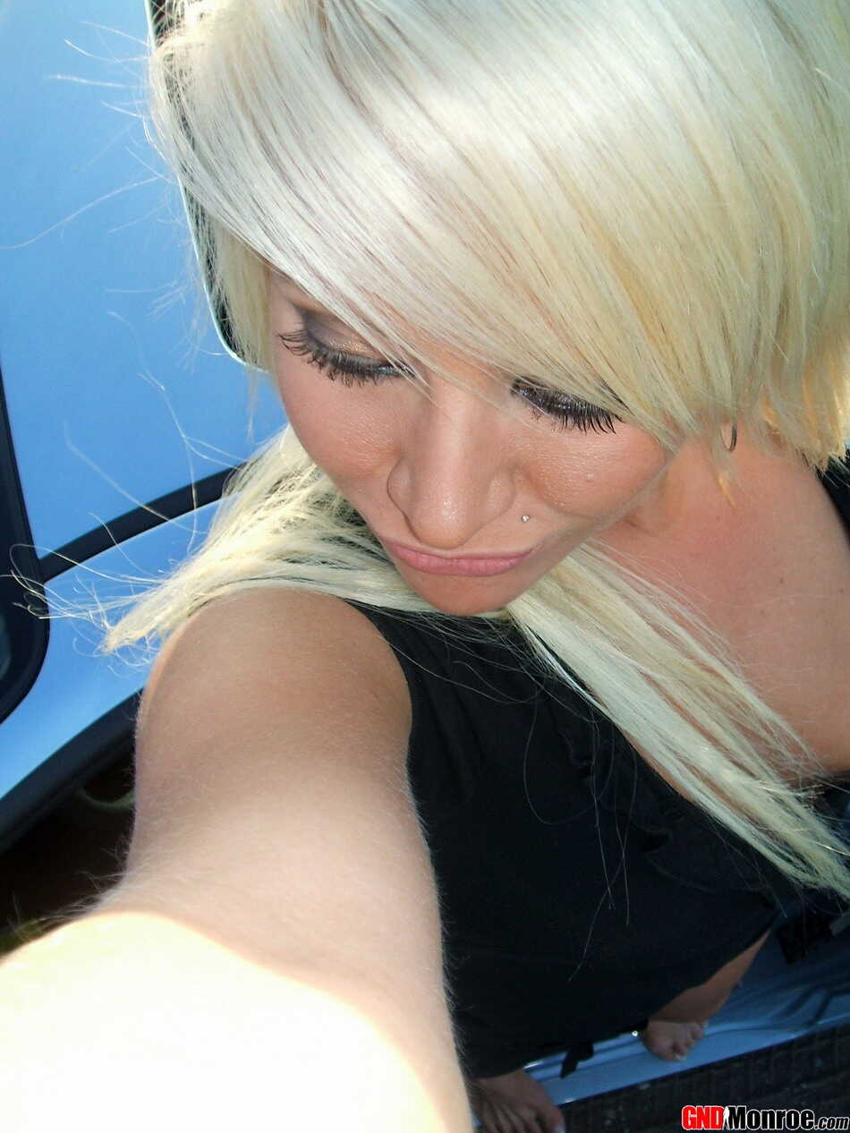 Blonde goddess takes a sexy car selfie