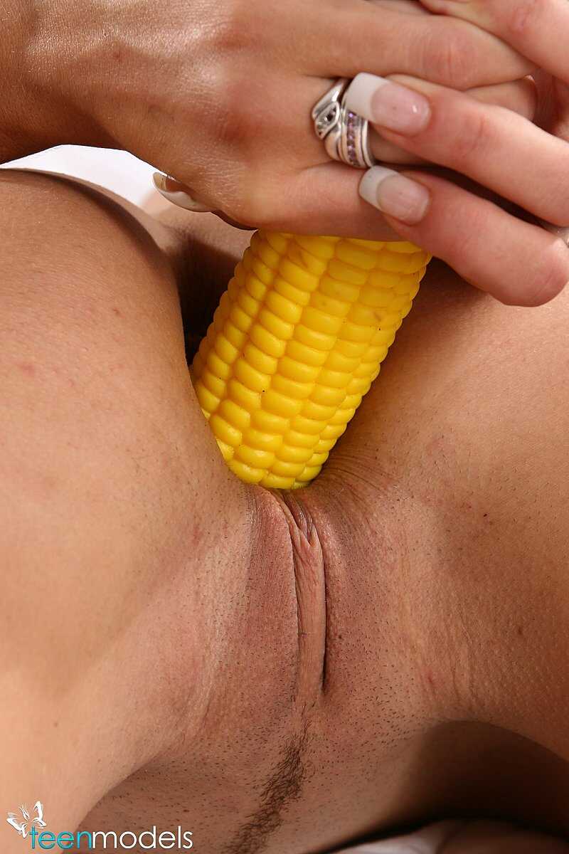 Innocent Young Thing Fucks Her Tight Little Hole With A Phallic Vegetable While Wearing A Skimpy Thong! - 