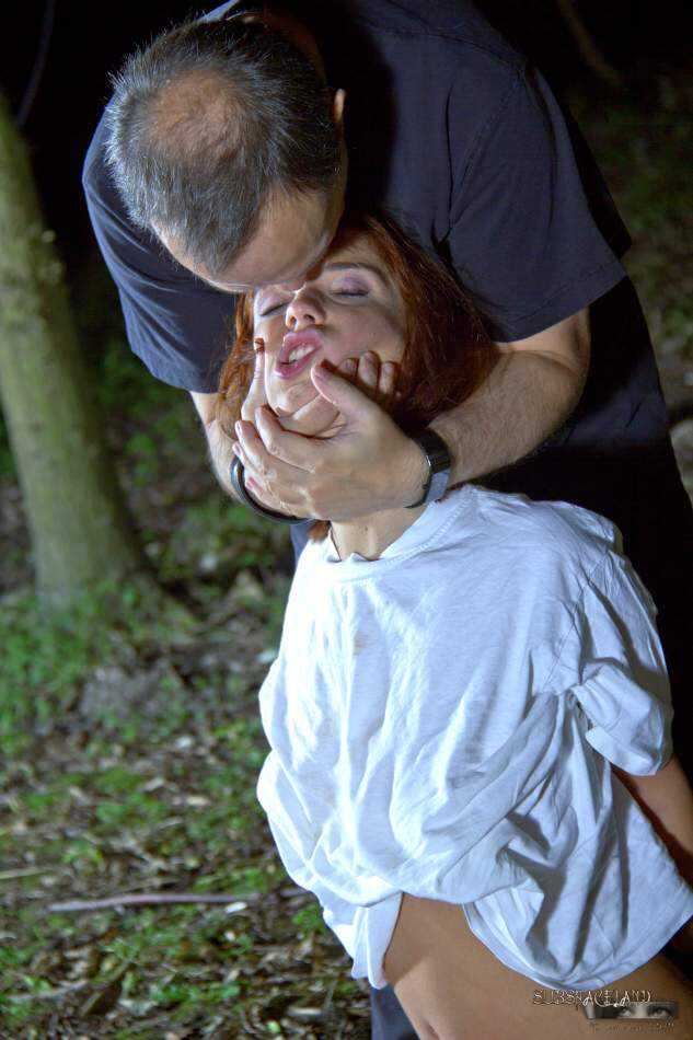 Skinny redhead teen Tina Hot endures extreme BDSM play in the forest at night while deepthroating her dominant partner - T...