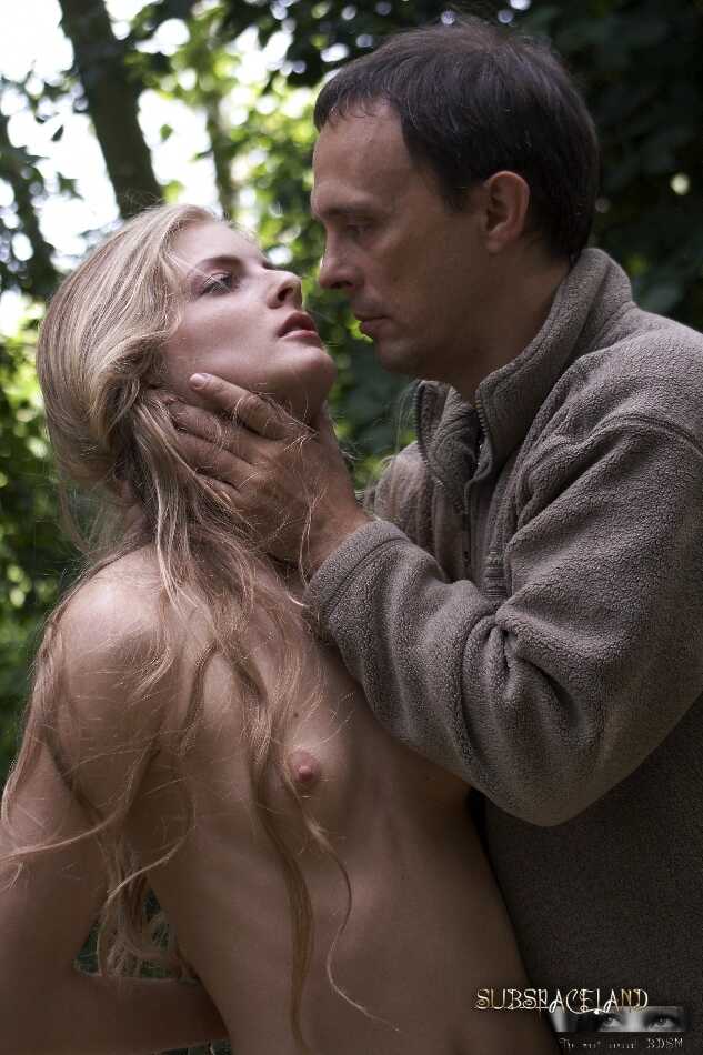 Young Cayenne blonde teen suspended upside down in the woods gets her hair pulled by a dominant nudist. - Cayenne Klein