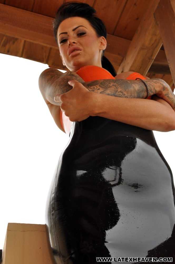 Stacey Lacey's Latex Obsession: Tattooed Brunette in Tight Fetish Wear on Balcony - Stacey Lacey