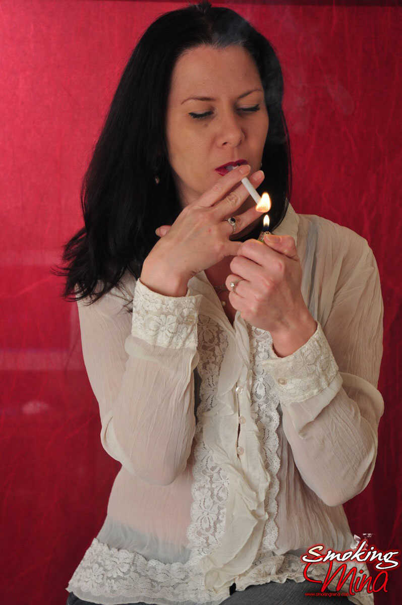 'Mina Brunette Chick Smokes Her Way to Naughty Pleasures' - Mina