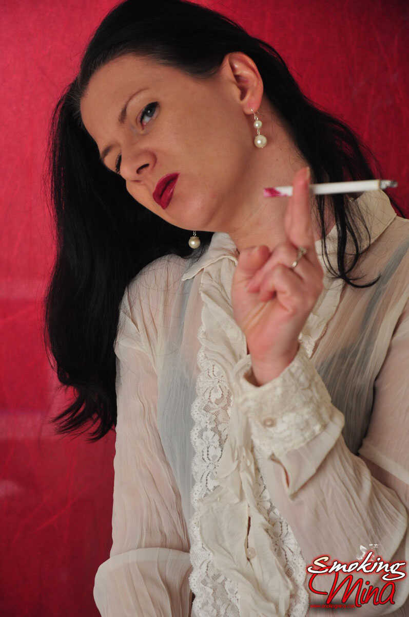 'Mina Brunette Chick Smokes Her Way to Naughty Pleasures' - Mina