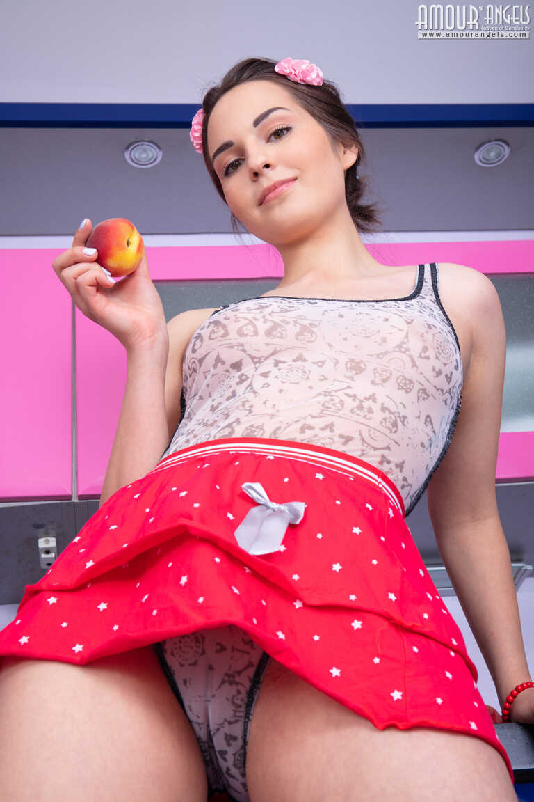 Cute teen Mi holds a couple of peaches while getting naked for the first time Exploring her innocent beauty with us! - Mi