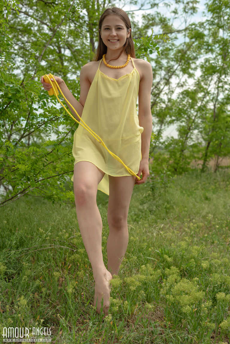 First timer Maat's thin body sets free on the bank of a body of water as she explores her nudist side outdoors! - Maat