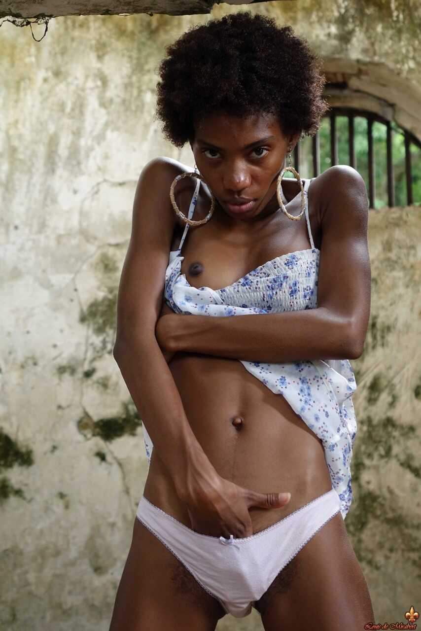 Long Legged Jess in Abandoned Building Exposes her Black Tits and Bush - Jess