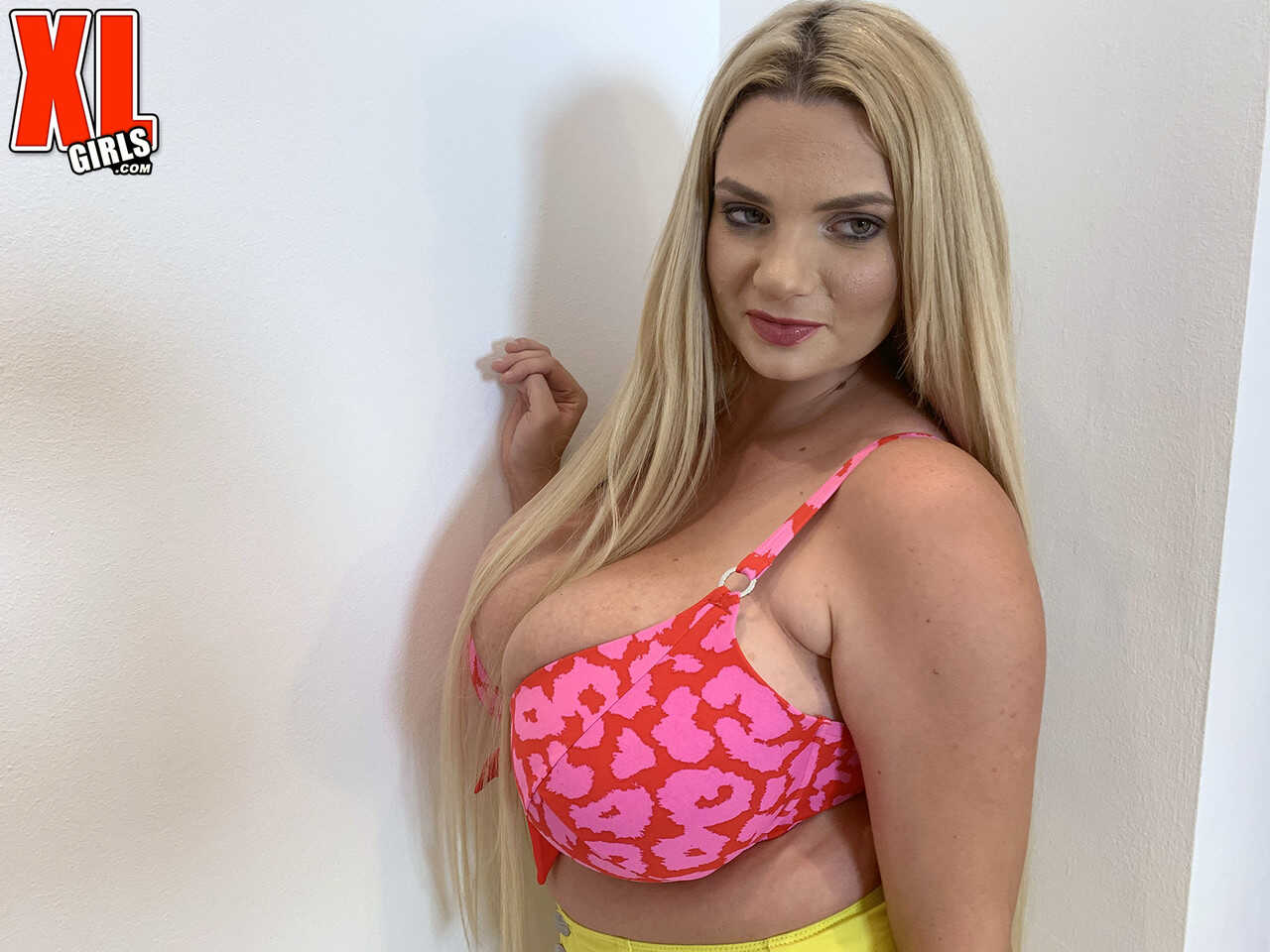 Chubby blonde Kitty Cute strips off her bra and panties, revealing her huge tits! - Kitty Cute