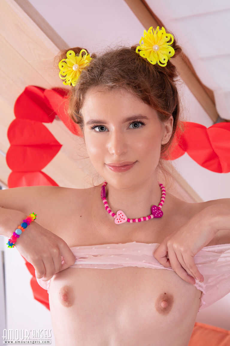 Adorable Ola gets naked in pink socks with flowers in her tiny tits and flat chest 