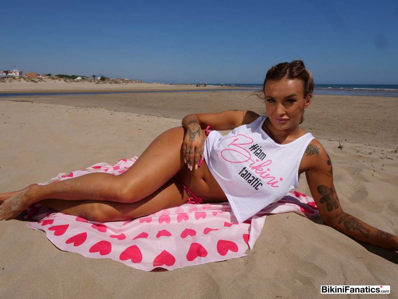 Beach Bound Daisy: The Tattooed Milf Exposes Her Juicy Pussy In The Sand - Daisy Lee