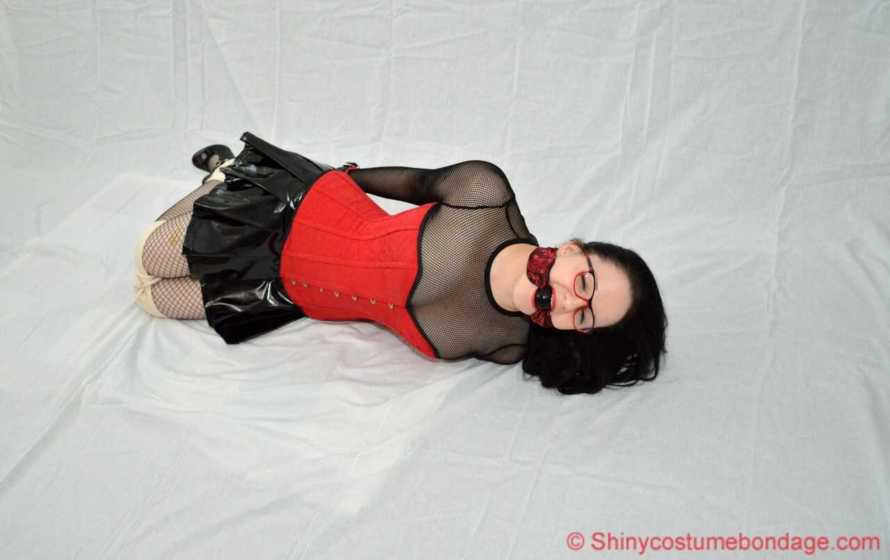 Glasses-Fetish Nerd in Latex Miniskirt Gets Tied Up and Teased by Dominant Geeks - 