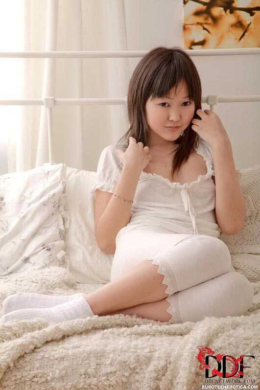 Exotic Asian beauty pleasures her petite pussy in socks while playing with her adorable ass - Aliona