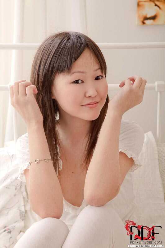 Exotic Asian beauty pleasures her petite pussy in socks while playing with her adorable ass - Aliona