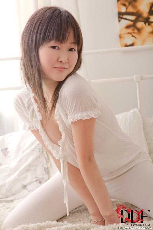 Exotic Asian beauty pleasures her petite pussy in socks while playing with her adorable ass - Aliona