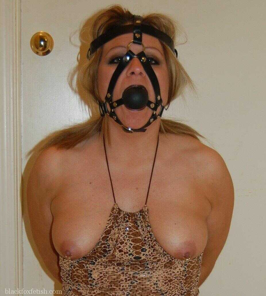 Bound Blonde Babe Adrienna Sucks on Gag While Stuffed into Tight Hose - Adrienna