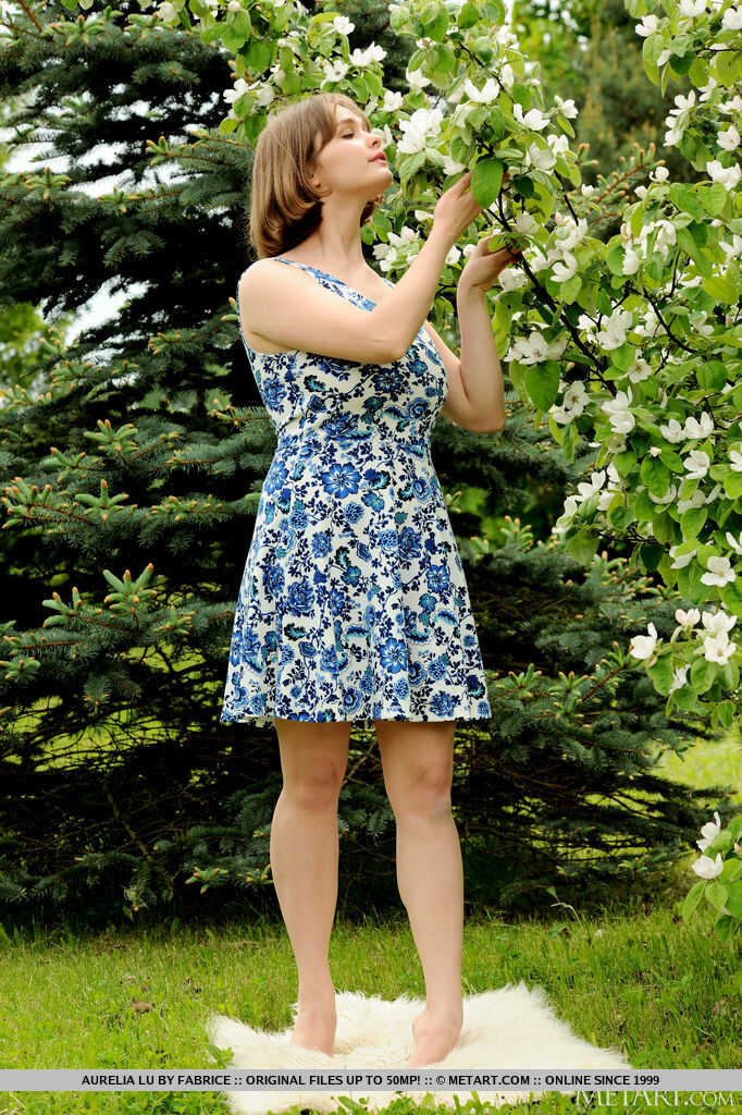 Big titted teen Aurelia Lu sniffs flowers before getting totally naked outside on a sunny day. - Aurelia Lu