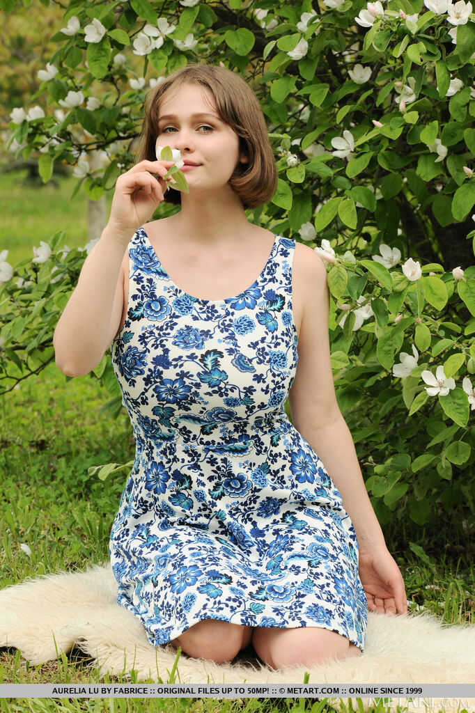 Big titted teen Aurelia Lu sniffs flowers before getting totally naked outside on a sunny day. - Aurelia Lu