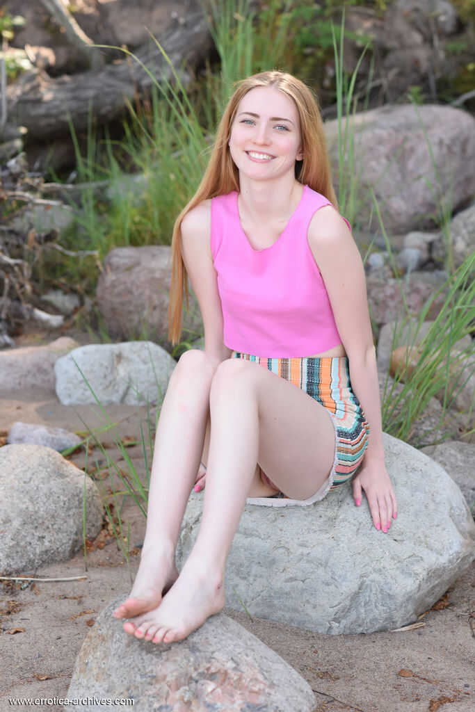 Barefoot young girl Lena Flora gets totally naked on a boulder in nature while spreading her perfect teen body. - Lena Flora